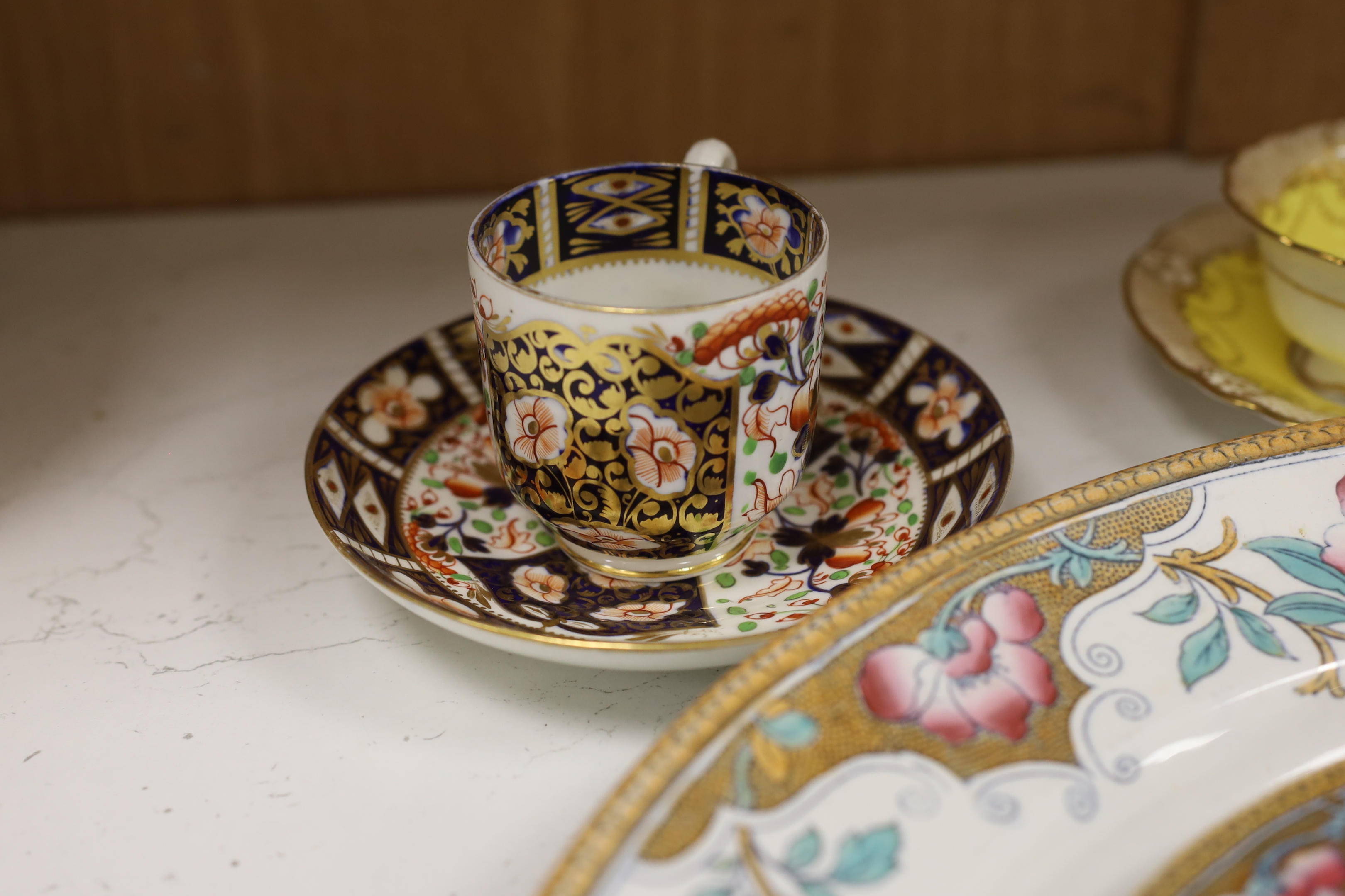 A Victorian stone china oval meat platter, a Derby cup and saucer, two others and two Spode ‘Italian’ plates, platter 50cm wide